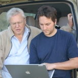 Sir David and assistant producer, Tim Green going over footage for "Life in the Undergrowth" while on location